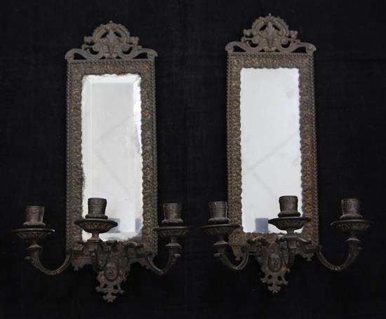 A pair of late Victorian bronze three light girandoles, 19.5in.